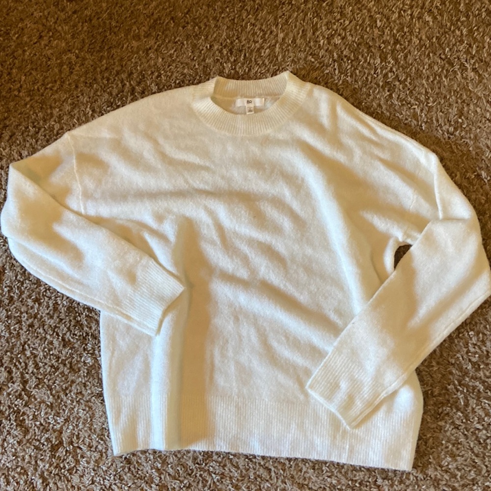 BP cream sweater